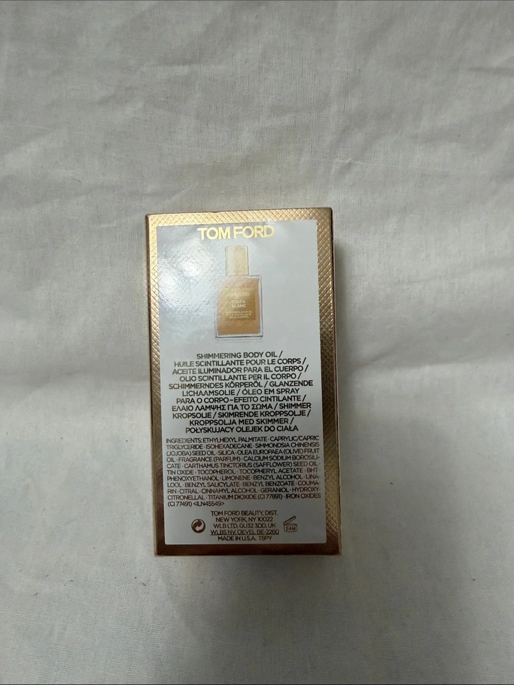 Tom Ford Shimmering Body Oil in Metallic Gold Packaging